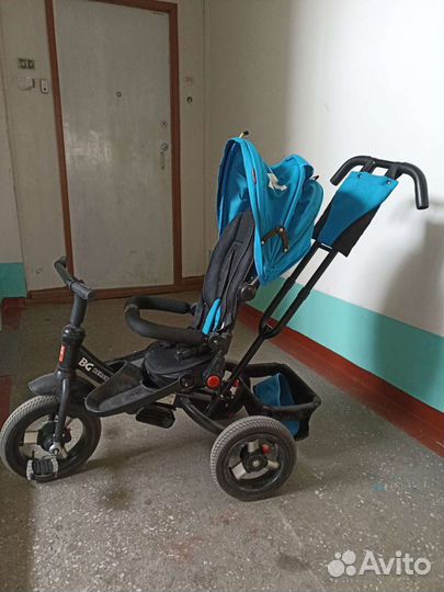 Трехколесный велосипед с поворотным сиденьем