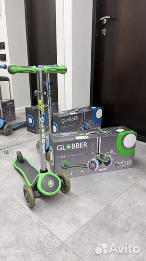 Трехколесный растущий самокат globber lights Neon