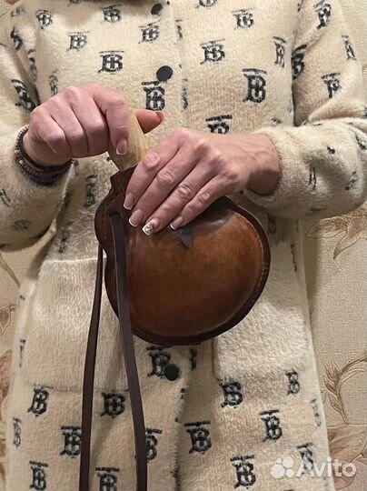 Бутылка из кожи