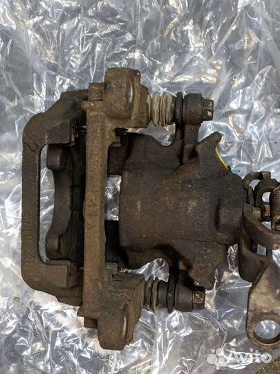 Задний тормозной суппорт Mitsubishi outlander