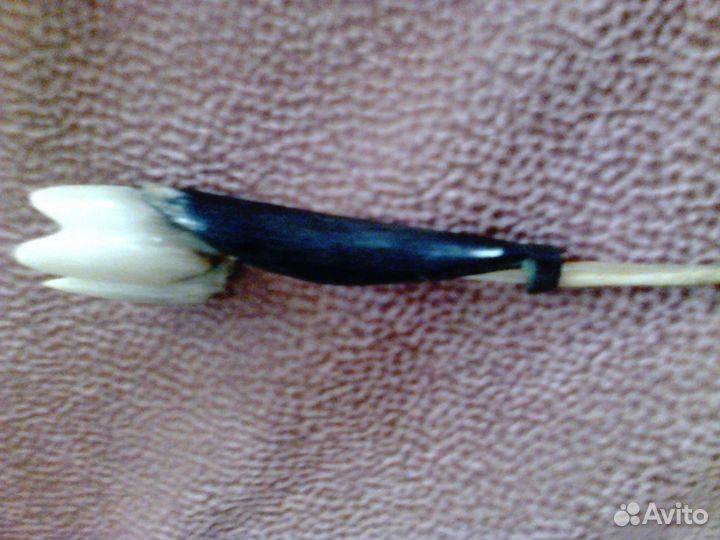 Цветок, вырезанный из кости