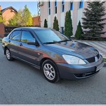 Mitsubishi Lancer 1.6 MT, 2009, 252 000 км, с пробегом, цена 404 000 руб.