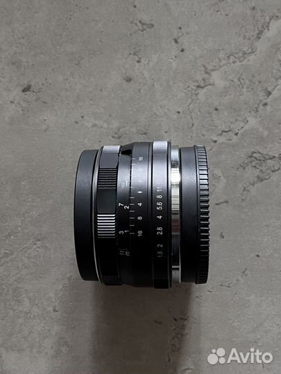 Объектив meike