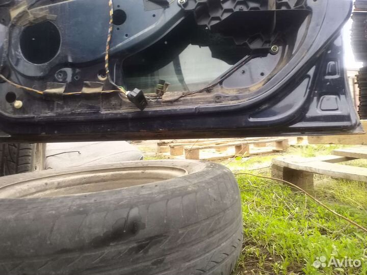 Передняя правая дверь лада калина 1