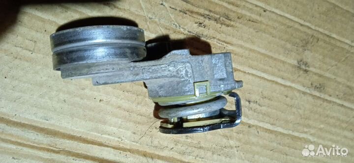 Натяжитель ремня генератора Astra h