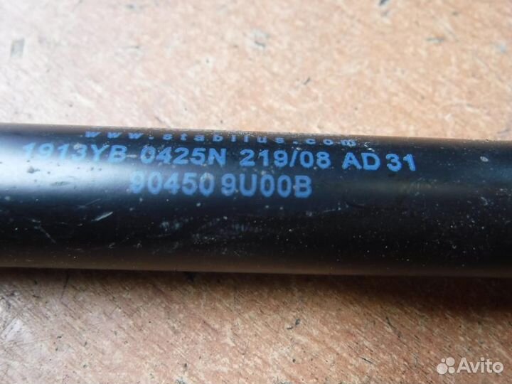 Амортизатор двери багажника Nissan Note -2013