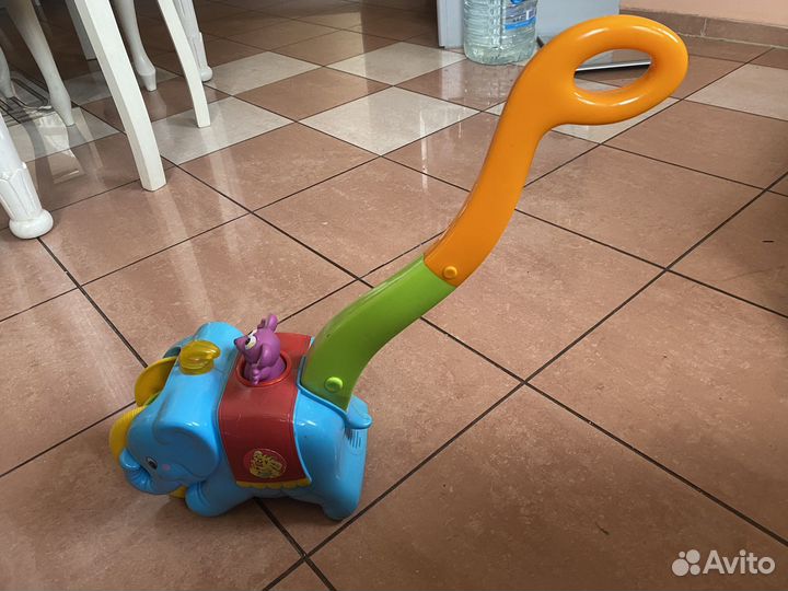 Детская машинка каталка музыкалькая