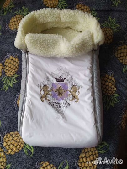 Меховой конверт в коляску
