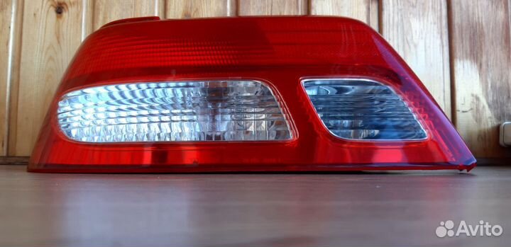 Фонарь левый задний Toyota Carina 1999 г.в