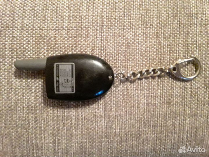 Продаю брелок автосигнализации scher khan a