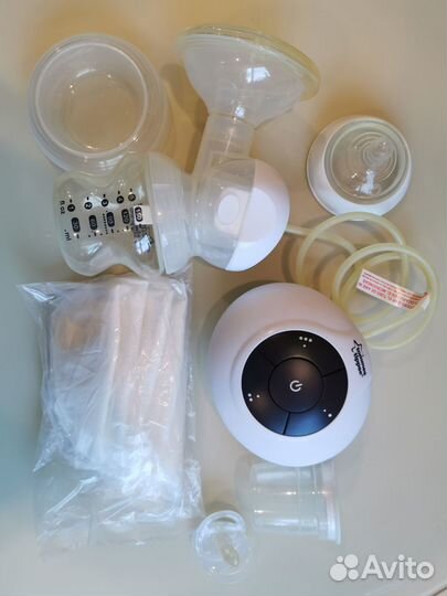 Электрический молокоотсос и стерилизатор