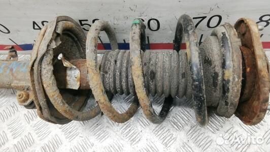 Стойка передняя левая toyota corolla E12 (JDN01K50