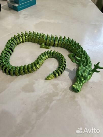 Игрушка подвижная дракон