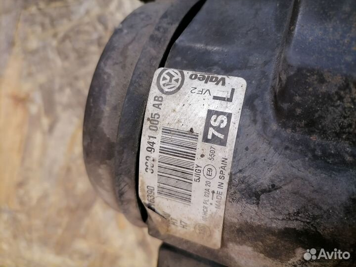 Фара галоген левая Volkswagen Passat B6