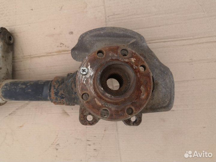 Амортизатор передний левый Daewoo Nexia N150 1.5