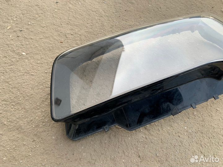 Стекло фары левой X3 E83