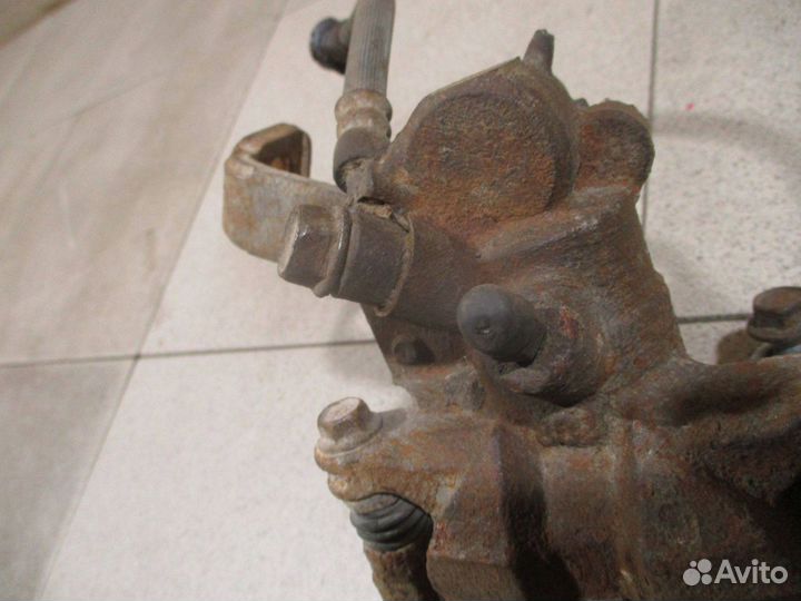 Суппорт задний левый Suzuki SX4