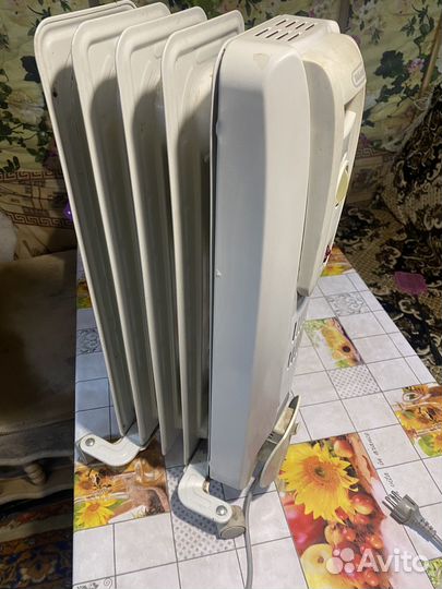 Масляный радиатор Delonghi