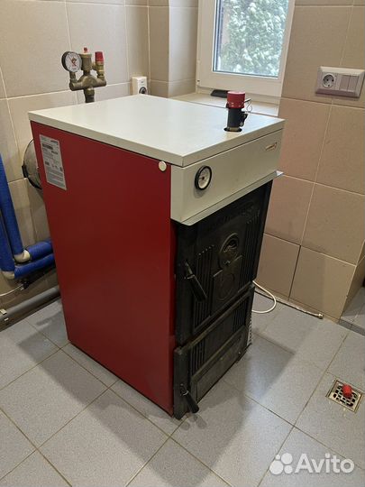 Котел отопительный на твердом топливе