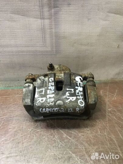 Суппорт передний правый Kia Cerato 3