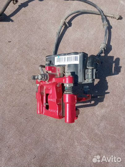 Суппорт задний левый Geely Coolray SX11