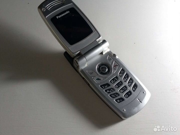 Кнопочный телефон Panasonic