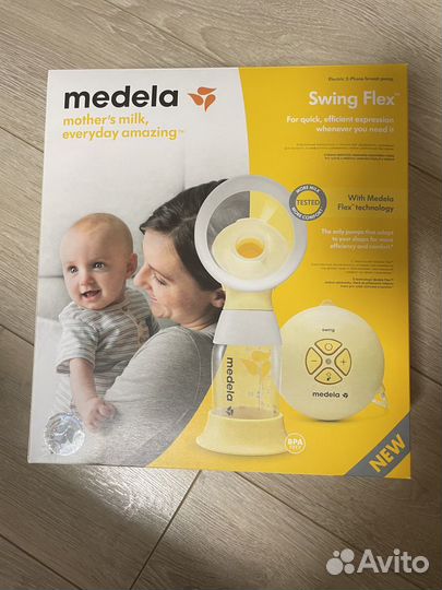 Молокоотсос medela электрический