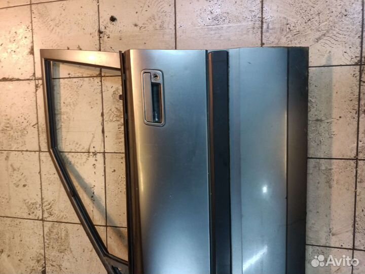 Дверь передняя левая Mazda 323 BG