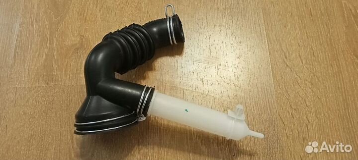 Сливной патрубок для стиральной машины