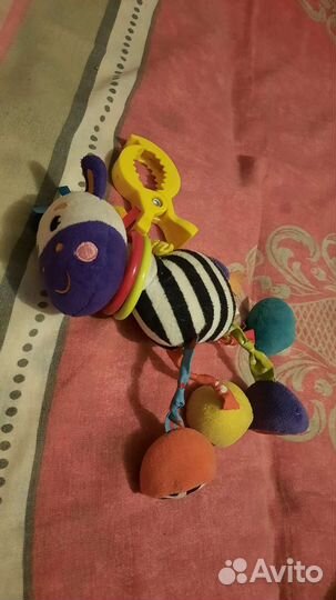 Игрушка на коляску