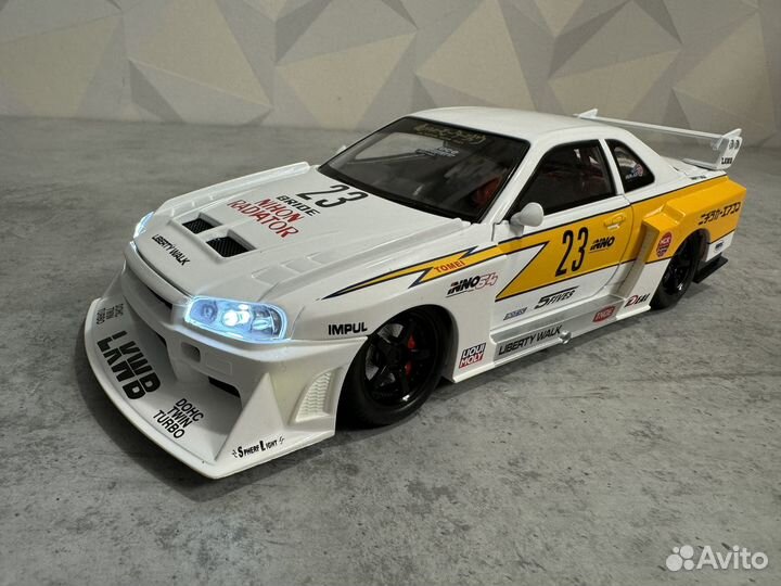 Модель авто Nissan Skyline GT-R R34 lbwk 1:24