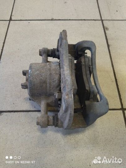 Суппорт тормозной передний левый Kia Rio 4