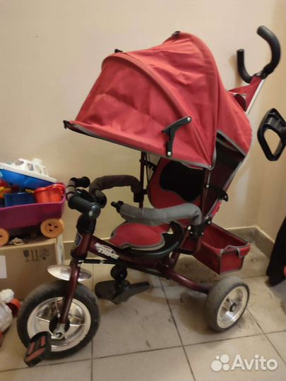 Трехколесный велосипед с ручкой