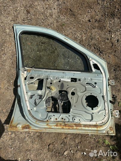 Дверь передняя левая renault logan 1