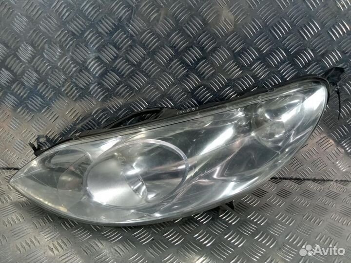 Фара левая 0301213201 Peugeot 407 (04-11)