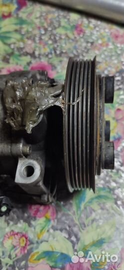 Компрессор кондиционера Lancer Cedia