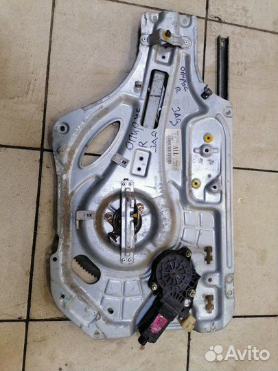 Стеклоподъемник задний правый Kia Opirus