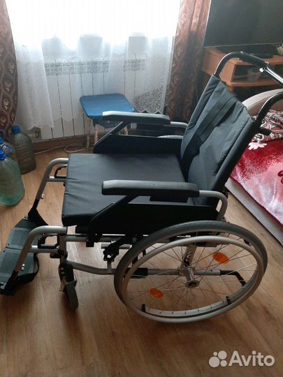 Коляска инвалидная:ортоника