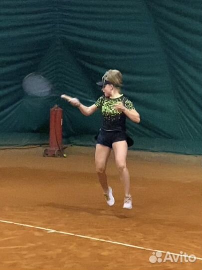 Тренер по большому теннису