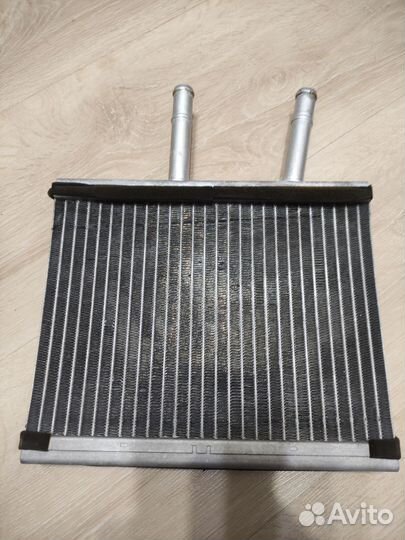 Радиатор печки Nissan Almera classic