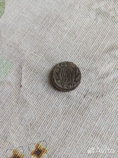 Монета полушка