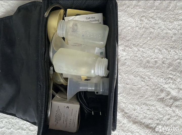 Молокоотсос medela электрический