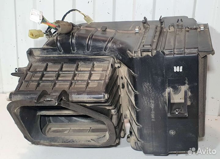 Корпус отопителя под моторчик Kia Spectra