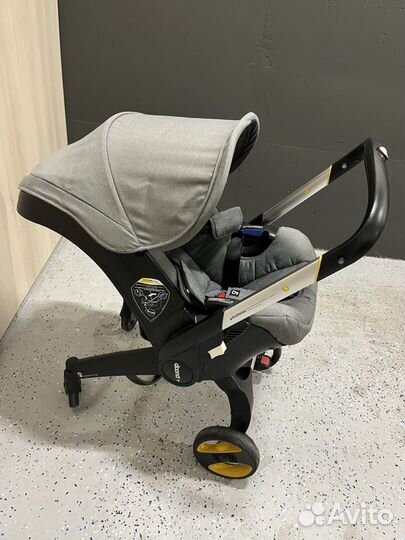 Коляска автокресло doona с базой isofix