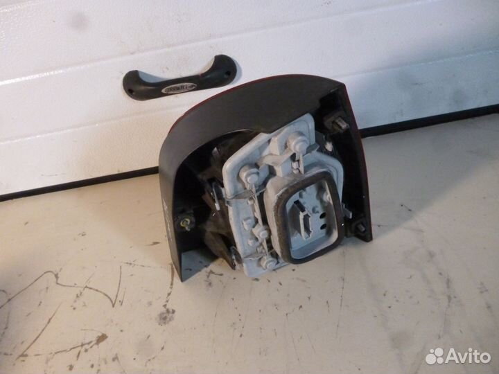 Фонарь задний левый Volkswagen Polo 01-05г