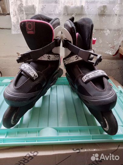 Роликовые коньки