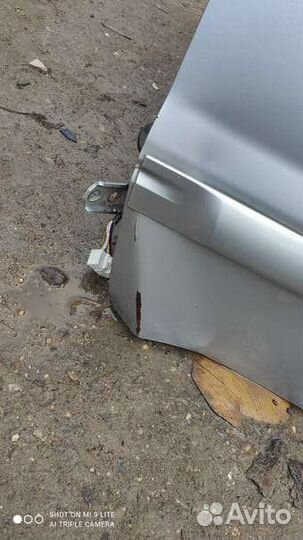 Мицубиси лансер 9 дверь передняя