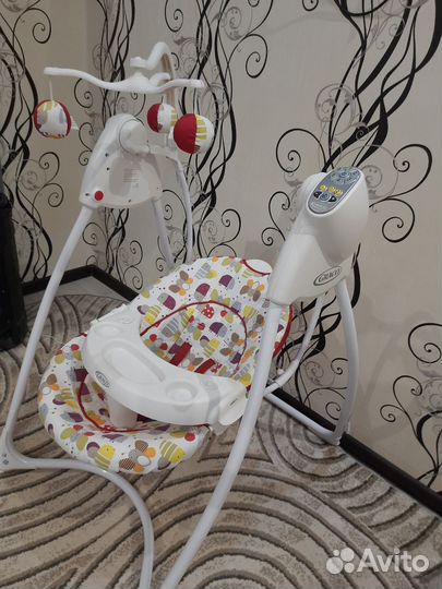Детские электронные качели graco