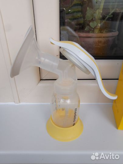 Молокоотсос medela ручной