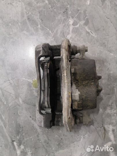 Суппорт тормозной передний правый Kia Sorento